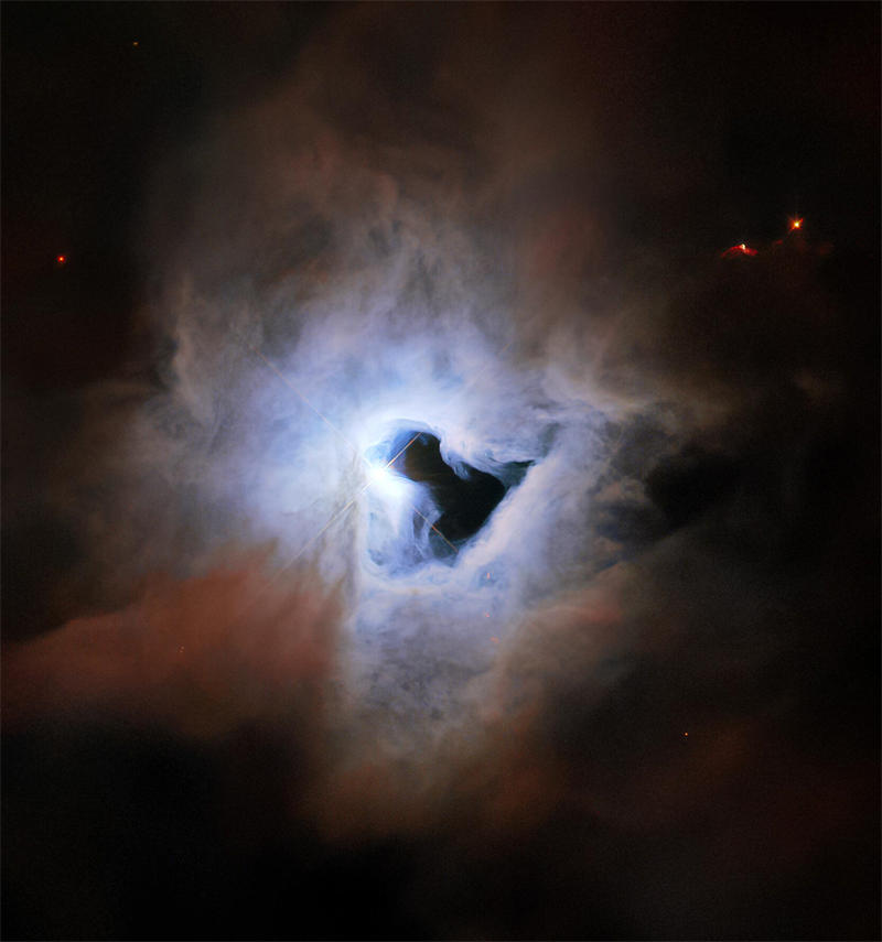 NGC 1999星云中间是一个心形空洞，旁边那颗亮星就是V380 Orionis，正是它形成了这个星云，也是它照亮了这个星云
