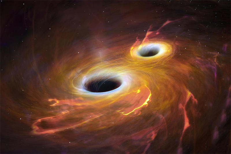 两个即将碰撞合并的超大质量黑洞想象图