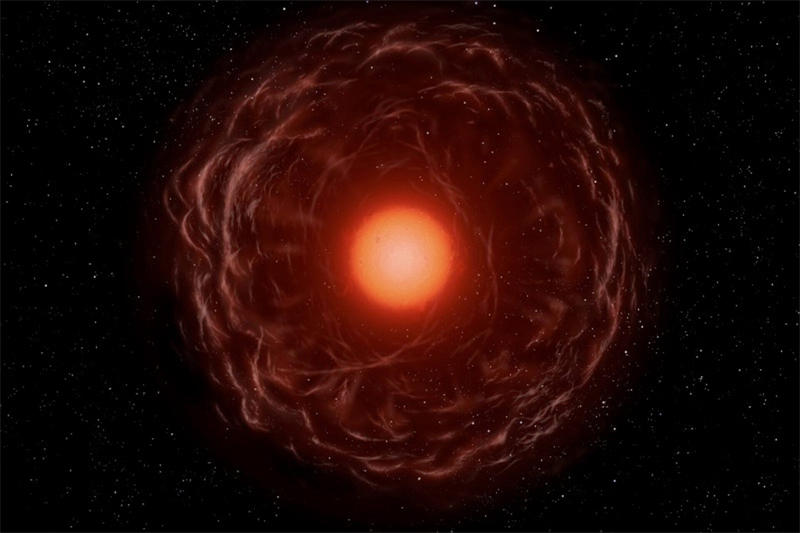 艺术家笔下的红巨星吹出其表面物质的想象图，来源：ESA