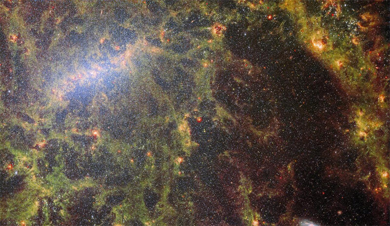 NGC 5068由韦伯MIRI和NIRCam所拍摄的合成图。图片来源：图片来源：NASA / ESA / CSA / Webb / J. Lee / PHANGS-JWST Team