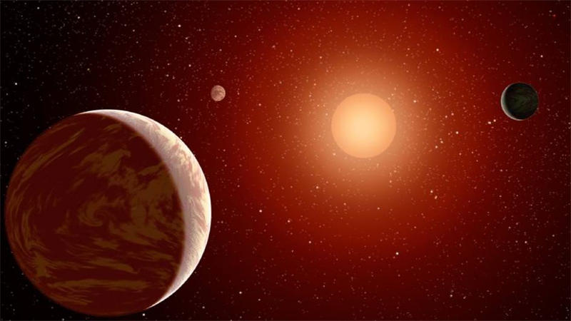 拉卡伊 9352恒星系统中的三颗系外行星想象图